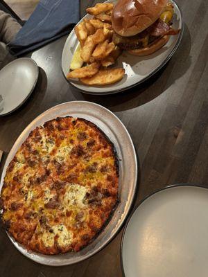 Sausage and ricotta pizza and the maple bacon burger with fries