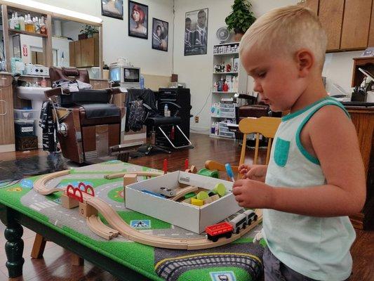 Come for the haircut, stay for the lollipops and trains.