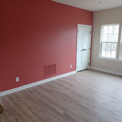 Red accent wall in this customer's brand new Ryan homes kitchen.  They added new color to the walls.