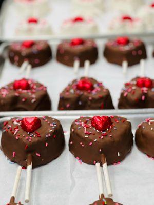 Homemade rice crispy treat dunked in milk
Chocolate