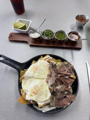 Green chilaquiles with barbacoa