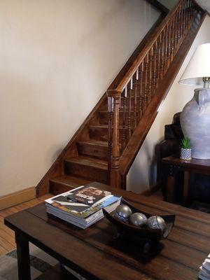 Hand wiped staircase dusted and rearranged table