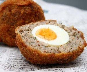 The Scotch Egg!  A Hard Cooked Egg, wrapped in sausage.  Can you say "Yum?"