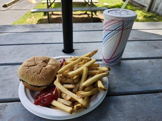 1/4 lb hamburger,  fries, large soft drink.