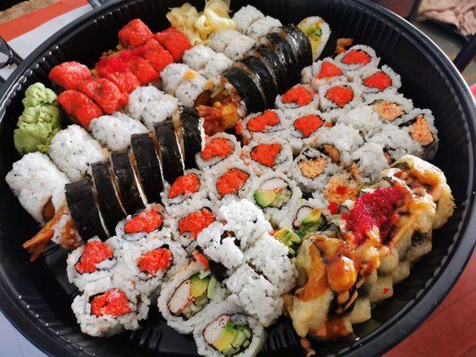 Sushi platter - 2 signature rolls and 8 classic rolls, $80 (20% off if order online, thus $64)