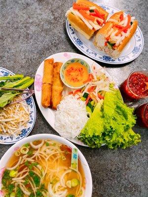 Plain Pho, Spring Rolls with vermicelli noodles and some lettuce, and a Tuna Bahn Mi (sandwich)