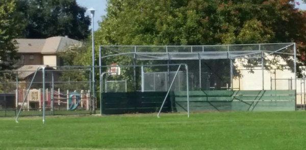 Closer view of baseball diamond /Basketball court/ kids play area.