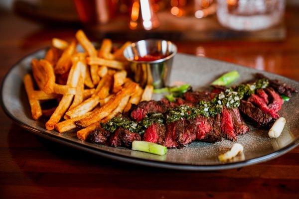 Grilled Skirt Steak 
 Chimichurri, French Fries, Grilled Scallions, Ginger Ketchup