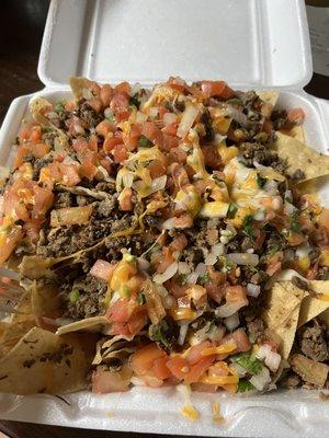 Nachos, but they forgot the guacamole.