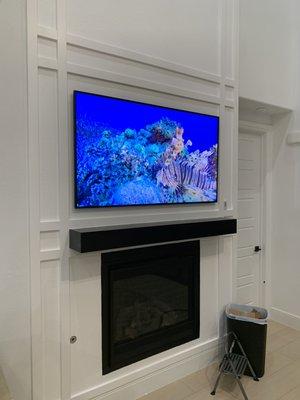 Samsung Frame TV Mounted Over Fireplace.