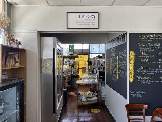 View of kitchen and menu. Hangry sign