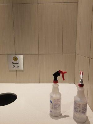 Pick up spare spray bottles in towel drop in the restroom if none at the front.