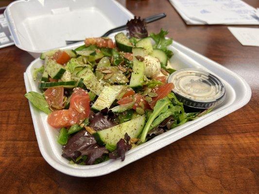 "Power salad" with greek dressing, dash of lemon, extra cucumbers, and light avocado