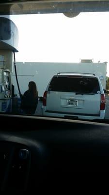 Too funny soccer mom been standing there 5 mins. She could not fig out how to put gas in the mom van.