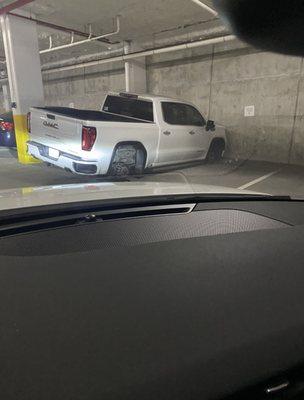 Rims stolen off the vehicle in the parking garage