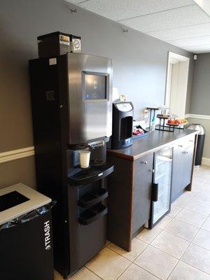 Auto espresso machine at the waiting area. Surprisingly, an amazing coffee it brews tastes very nice.