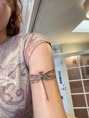 Dragonfly tattoo upper arm