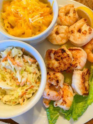 Shrimp entree, coleslaw + mac & cheese. Also comes with cocktail sauce