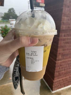 Maple white chocolate iced coffee with whipped cream