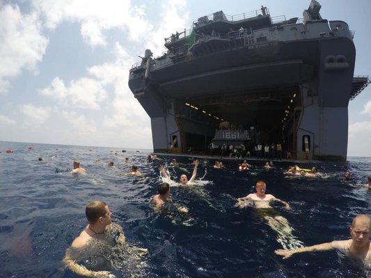 Navy swim call somewhere in the ocean.