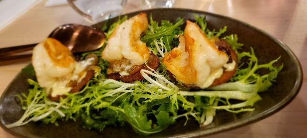 Chrispy Apple- Slice of fried apple with caramelized unions with Shrimp on a fresh lightly dressed salad