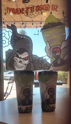 Spooky slush made with matcha slush, taroilk cap and crushed Oreo.