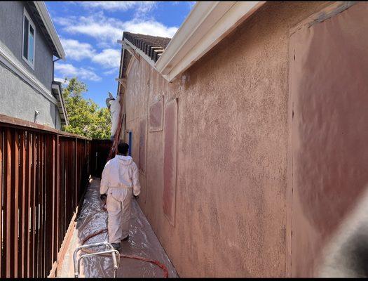 Painting the first coat.