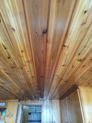 Installation of knotty cedar tongue and groove ceiling