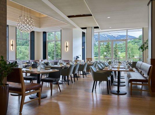 Stoke & Rye's sunlit dining room opens on to a patio with stunning Beaver Creek views.