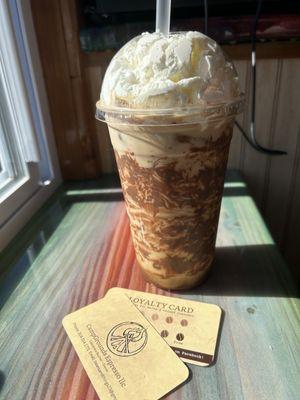 Iced Italian Hazelnut! One of our signature drinks. Nutella around the cup, hazelnut, espresso, cream and whipped cream!