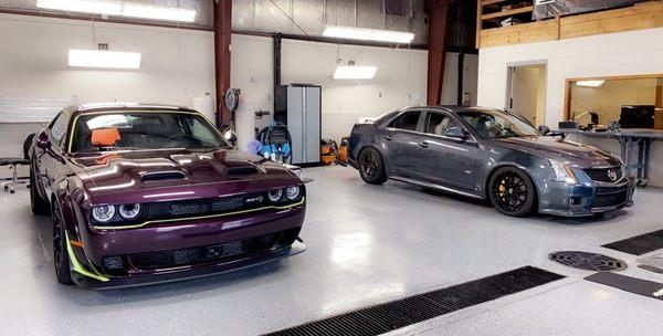 Dodge Hellcat wide body and a Cadillac CTS-V in for some detail work.