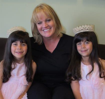 Supervising nurse extraordinaire, Debbie Thompson, with our twin girls.  Even years later, we still come by to visit ART!