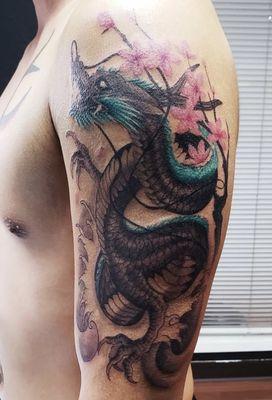 Dragon tattoo by Carson 2024