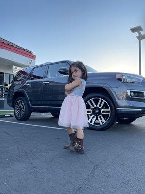 My daughter couldn't wait to look savage in daddy's new whip