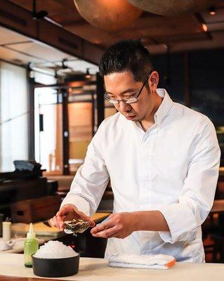 Chef Gene-San creating the Momotaro oyster.