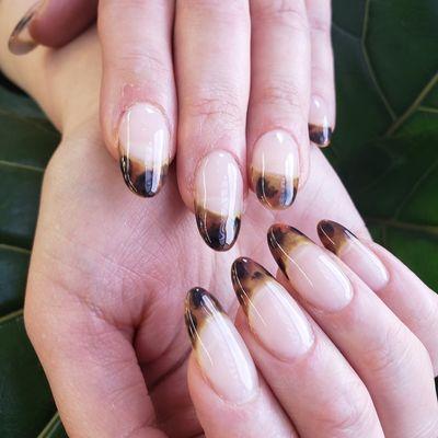 Aprés Gel X extensions with hand painted tortoiseshell nail art.