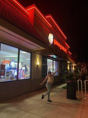 Jenn in front of Chuck E. Cheese