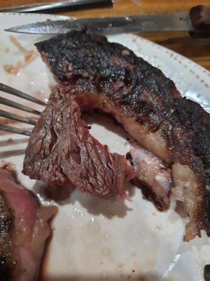 You can see one size of my steak is charred while the other is hardly even brown.  A very uneven cook.