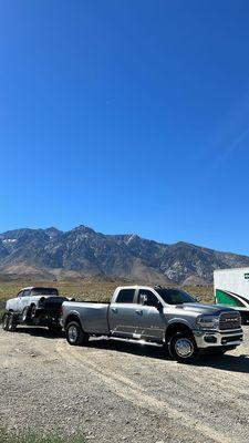 20ft car hauler with winch towing a 55 bel air