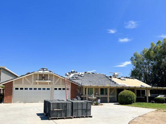 Tile roof being installed.