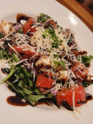 Tomato & mozzarella over spring mix salad drizzled with balsamic vinegarette.... very delicious $4.75