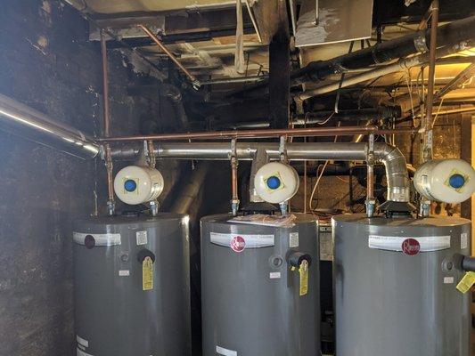 Multiple water heater tanks