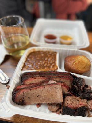 Brisket plate with baked beans & cornbread...glass of Chardonnay too!