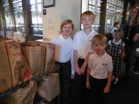 Holy Family Gives Back: kNOw Hunger campaign collected over 500 bags of food for Catholic Charities in October 2015