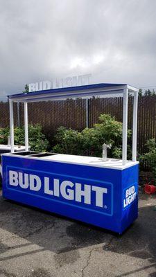 Beverage cart with custom graphics and sign.