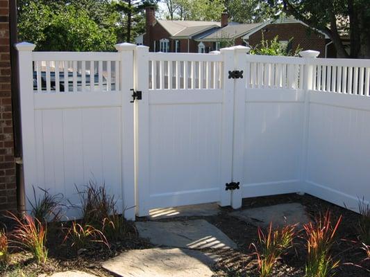 White Vinyl Picket Top Fence. 