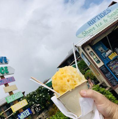 Organic fruit ice with mango & pineapple with vegan sweet coconut milk drizzle.