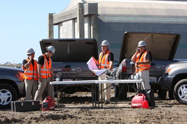 Our Field Technicians hard at work on a job site collecting samples for testing.