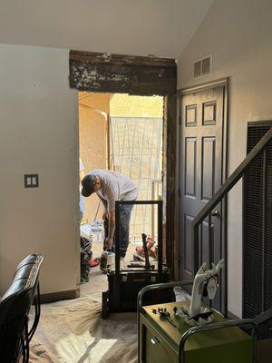 This is the door frame and water damage. The wood was rotting.