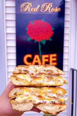 Bacon egg and cheese and Red Rose's signage